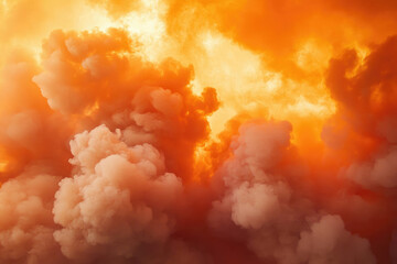 A breathtaking view of vibrant orange and peach colored smoke clouds filling the sky.