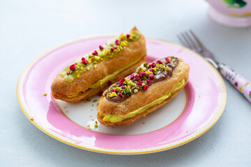 Pistachio cream filled eclairs