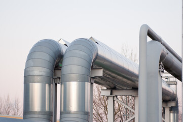 close-up of pipeline against gray wall
