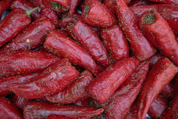 An Indian Homemade stuffed Red Chilli Pickle Also Known as Mirchi Ka Achar, bhara mircha or Laal Mirch Ka Achar. 