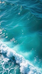 Fototapeta premium Vibrant blue turquoise sea, breaking waves with white foam, undulating, design, white