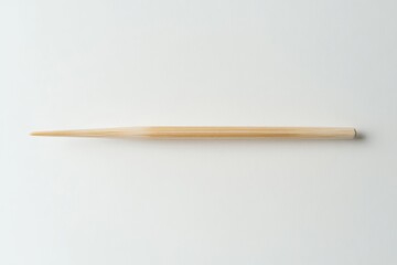 Obraz premium Single Toothpick on Plain White Background