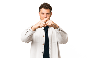 Brazilian man over isolated chroma key background showing a sign of silence gesture