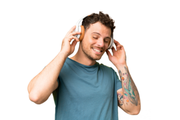 Brazilian man over isolated chroma key background listening music and singing