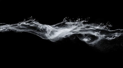 Liquid particles in motion, forming delicate streams as they flow through the air.