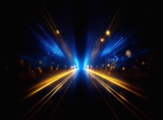 Obraz premium Grainy texture of speeding lights at night, streaks of blue and gold illuminate a dark, urban roadway. The perspective is from within the vehicle, creating a sense of dynamic movement.