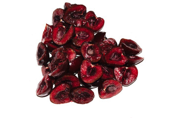 Closeup of chopped cherry fruit in a healthy heart shape on white background