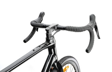 Black gravel bike with drop handlebars on white background. Side view