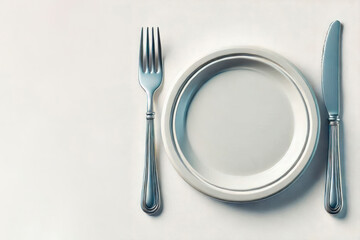 Plate with fork and knife on a light background. Space for text.