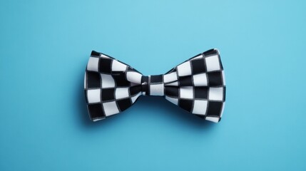 A bow tie in a checkered pattern, set against a soft pastel blue background.