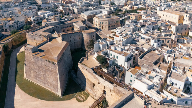 Aerial view old city with Castello Aragonese and white buildings on sunny day, Otranto, Puglia, Italy