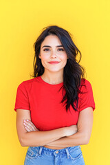 Obraz premium Confident woman posing in vibrant lifestyle portrait against yellow background