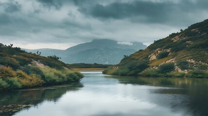 Serene Mountain River Reflecting a Cloudy Sky