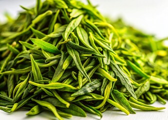Fototapeta premium Lush Green Tea Leaves Pile on White Background - High-Resolution Stock Photo