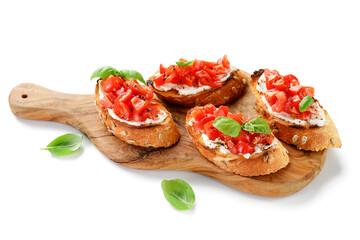 Cherry tomatoes and cream cheese bruschettas with fresh basil leaves. isolated on white background
