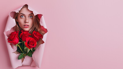 Arresting Beauty Peers Through Torn Pink Paper Clad In Roses.