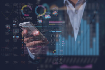 Businessman using smartphone analyzing trading graph financial data. Business finance background.business finance technology and investment concept. Stock Market Investment Fund and Digital Asset