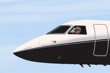 A man is sitting in the cockpit of a plane