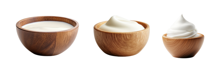 Assorted creamy desserts in wooden bowls