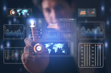 An analyst present or touching dashboard for data business analysis and Data Management System with KPI and metrics connected to the database for technology finance, operations, sales, marketing