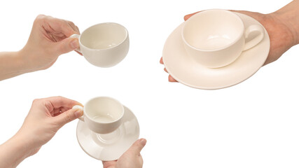 Female hand holding coffee cup and saucer isolated on white background.