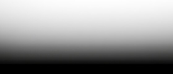 Smooth gradient greyscale background with soft transition from light to dark