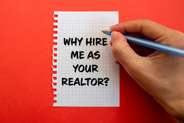 Why hire me as your realtor message written on white paper on red background. Conceptual why hire me as your realtor symbol. Copy space.