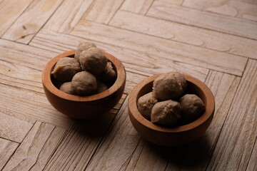 beef meatballs in a wooden bowl. bakso sapi.