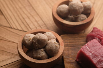 beef meatballs in a wooden bowl. bakso sapi.