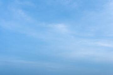 Serene Light Blue Sky with Thin Cirrus Clouds Peaceful Nature Background