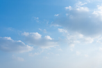 Serene Blue Sky with Fluffy White Clouds Peaceful Nature Background Image