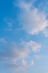 Serene Blue Sky with Fluffy White Clouds Peaceful Nature Background Image