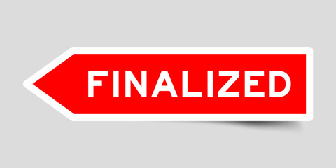 Red color arrow shape sticker label with word finalized on gray background