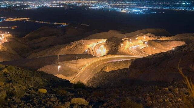Time Lapse of car trial at night Hafeet mountain, Al Ain, Abu Dhabi, UAE