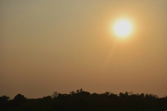 landscape of sun falling in sunset on mountain at Thailand  