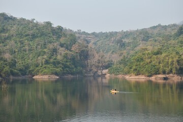 Fototapeta premium kayak boat and landscape of mountain on sunset in Wang Bon reservoir Thailand 