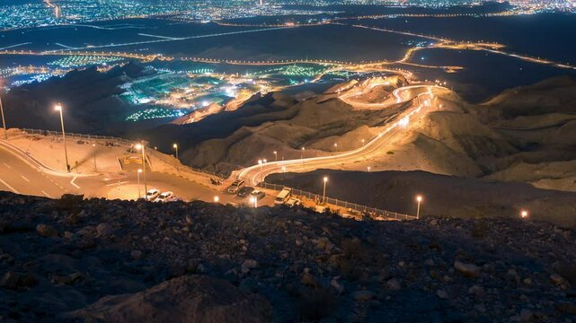 Time Lapse of car trial at night Hafeet mountain, Al Ain, Abu Dhabi, UAE