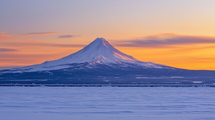 Sweeping Snow-Covered Field with a Solitary Mountain Peak Bathed in Amber and Blush Winter Sunset Hues Under an Expansive Sky