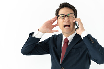 電話をするビジネスマン