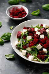 Fresh Beetroot feta salad with wild rocket and lemon dressing. Healthy food.