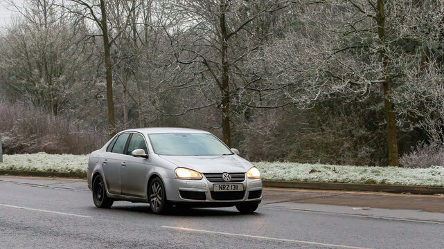 Milton Keynes,UK - Jan 12th 2025:  2009 Volkswagen Jetta  car driving on a cold,frosty morning