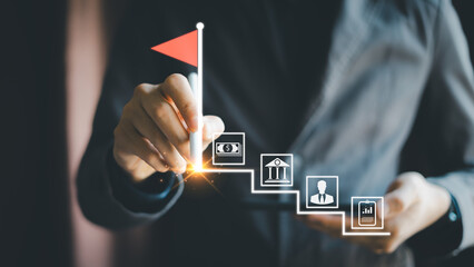Businessman touching success in ending with red flag, business growth strategy, steps, vision, financial progress, success goal, planning, path, employee cooperation. © Father_Studio
