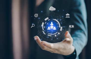 Fototapeta premium Businessman showing virtual glowing holding futuristic network symbols download and load data information and upload network application system. Data transfer. Technical data transformation concept.