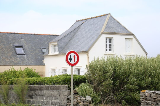 French house with a street sign