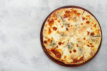 Freshly baked cheese pizza, white pizza, on a wooden plate, homemade, no people,