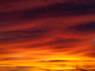Dusk, Sunset Sky Clouds in the Evening with colorful Orange, Yellow, Pink and red sunlight and Dramatic storm clouds on Twilight sky, Landscape horizon