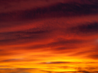 Dusk, Sunset Sky Clouds in the Evening with colorful Orange, Yellow, Pink and red sunlight and Dramatic storm clouds on Twilight sky, Landscape horizon