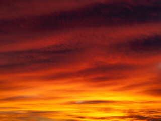 Dusk, Sunset Sky Clouds in the Evening with colorful Orange, Yellow, Pink and red sunlight and Dramatic storm clouds on Twilight sky, Landscape horizon