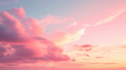 Obraz premium A smooth pink gradient with a subtle blend of darker and lighter hues, resembling the soft glow of a sunset sky, ideal for creating an elegant and peaceful background.