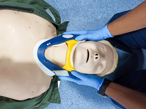 training manual inline stabilization protect cervical injury with dummy